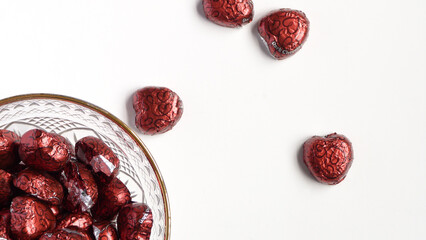 Chocolate Hearts on a White Background with a Crystal Bowl | Valentine's Day Chocolate | Valentine's Day Chocolate Hearts | Valentine's Candy