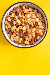 oat or corn flakes quick breakfast portion on the table for healthy meal snack outdoor top view copy space for text food background rustic image
