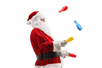 Santa claus juggling with clubs