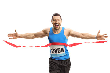 Young man finishing a marathon race on the finish line