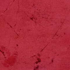 Cardboard red abstract pattern texture close-up. Retro old paper background. Grunge concrete wall. Vintage blank wallpaper.