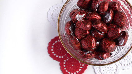 Chocolate Hearts in a Crystal Bowl on a White Background  | Valentine's Day Chocolate | Valentine's Day Chocolate Hearts | Valentine's Candy