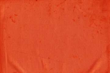 Cardboard red abstract pattern texture close-up. Retro old paper background. Grunge concrete wall. Vintage blank wallpaper.