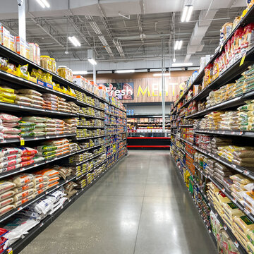 The Rice Aisles Of A Bravo Market Grocery Store In Orlando, Florida.