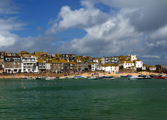 View From Smeatons Pier To The Wharf Of St Ives Cornwall England On A Sunny Summer Day With A Few Clouds In The Sky