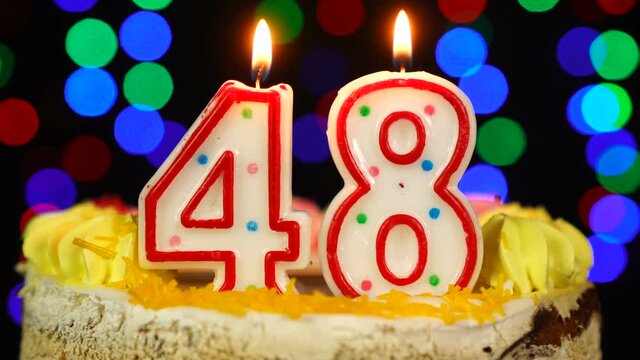 Number 48 Happy Birthday Cake With Burning Candles Topper.