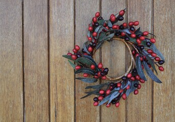 Christmas wreath on wooden door