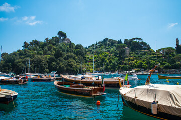 Fototapeta na wymiar Portofino is an Italian fishing village and vacation resort famous for its picturesque harbour and historical association with great and the good of celebrity and artistic visitors. 