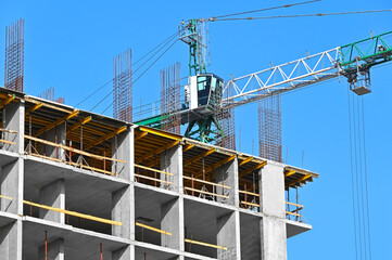 Crane and highrise construction site