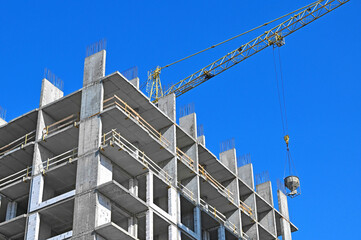 Crane and highrise construction site