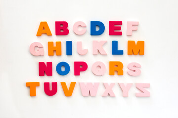 Multicolored letters alphabet on white background