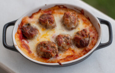 Homemade meatballs with cheese in fried