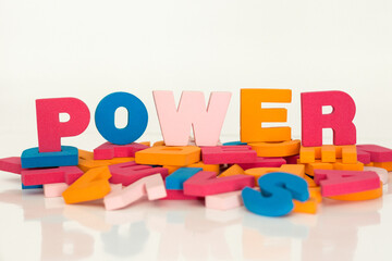 Word made up of multicolored letters. Power