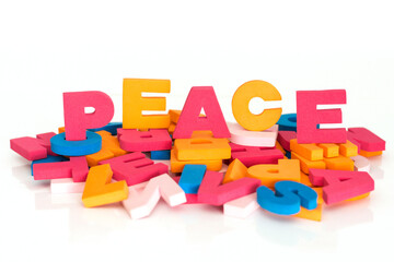 Word made up of multicolored letters. Peace
