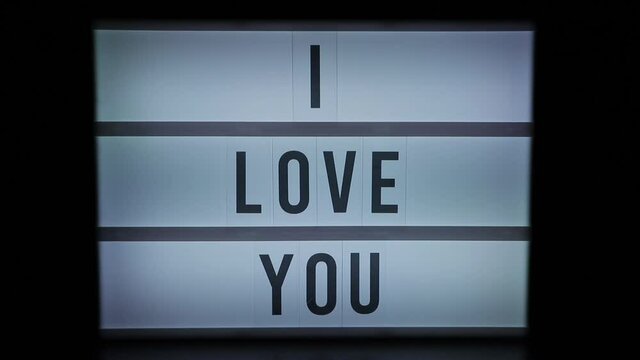 bright sign with i love you written on it