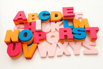 Multicolored letters alphabet on white background