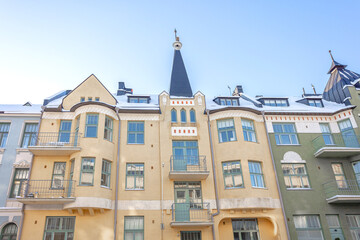 Facades and roofs of ancient buildings of the 19th century in the Ulyanin area, Helsinki, Finland