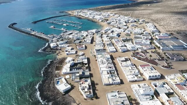 Aerial drone, pueblo costero, playa de la Graciosa, islas canarias