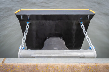 Close up of a marine fender absorber on the dock