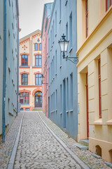 Narrow street in pastel colors
