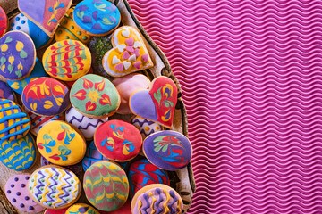 Fototapeta na wymiar Homemade, freshly baked and decorated, colorful Easter cookies.