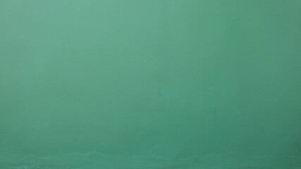 Light green cement wall. Abstract green texture pattern background for presentations and articles or copy space. Selective focus