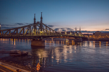 Fototapeta na wymiar View Of Bridge Over River Against Blue Sky