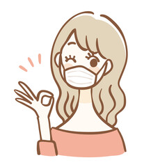 マスクをしてOKサインをする女性