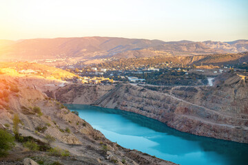 
Beautiful view of stone quarry with blue water at sunrise time