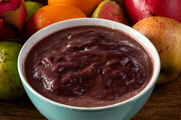 Acai (Açai), Brazilian Tradicional Fruit with Tropical Fruits on a Bowl on  Wooden Table 