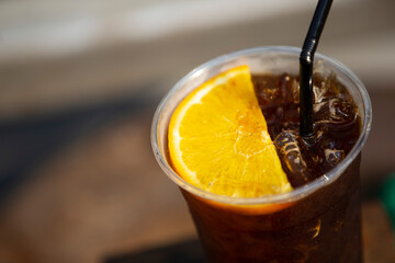 glass of coffee mix orange juice with ice