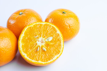 Orange on white background isolated, Asian tropical fruits whole good for healthy drinks and juice. Very natural sweet flavor. Tangerine, mandarine, Thai honey sweet green. Close up shot food concept