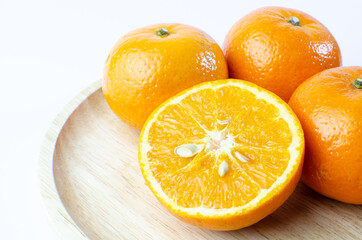 Orange on white background isolated, Asian tropical fruits whole good for healthy drinks and juice. Very natural sweet flavor. Tangerine, mandarine, Thai honey sweet green. Close up shot food concept