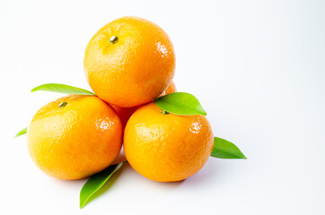 Orange on white background isolated, Asian tropical fruits whole good for healthy drinks and juice. Very natural sweet flavor. Tangerine, mandarine, Thai honey sweet green. Close up shot food concept
