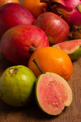 Tropical Fruits Background on Wooden Table