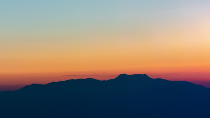 Fototapeta na wymiar colorful sunset on top mountain Thailand