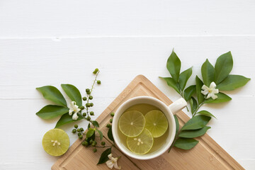 mix honey lemon herbal hot healthy drinks for sore throat with lemon slice and white flower jasmine...