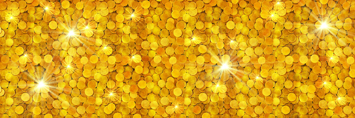A pile of glittering gold coins. Business concept panoramic banner background.