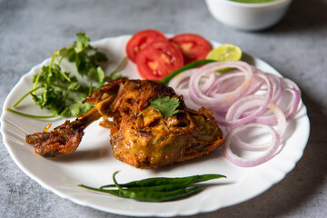 Close up of chicken tandoori in a plate with use of selective focus 