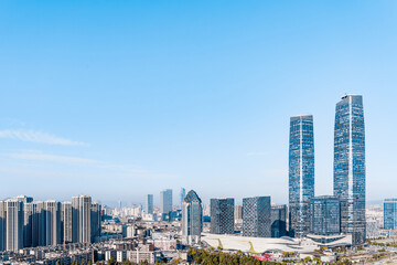 Sunny view of Kunming twin towers and city skyline in Yunnan, China 