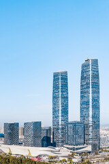 Sunny view of Kunming twin towers and city skyline in Yunnan, China 
