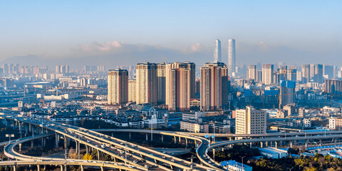 Fototapeta na wymiar The distant scenery of the Juhua Overpass and the Twin Towers in Kunming, Yunnan, China