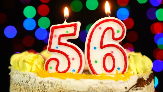 Number 56 Happy Birthday Cake With Burning Candles Topper.