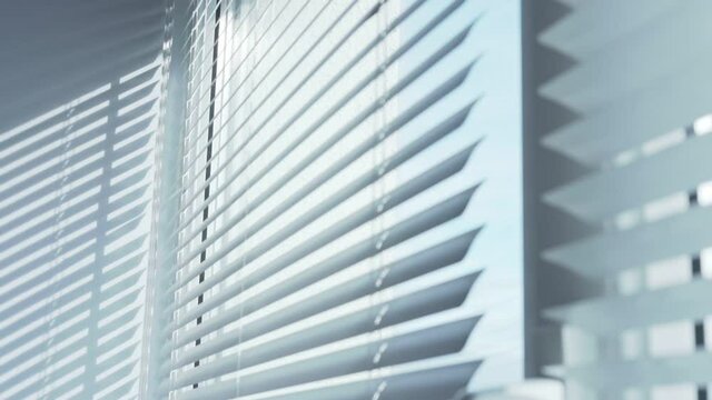 Modern white big window with rolled venetian blind and sunlight through gap. Concept window installation.