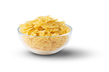 Raw organic farfalle pasta in a glass bowl isolated on a white background