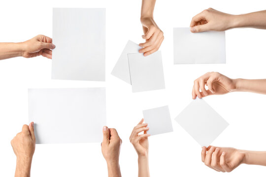 Set Of Male And Female Hands With Blank Paper Sheets On White Background