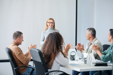 Team of business people during meeting in office