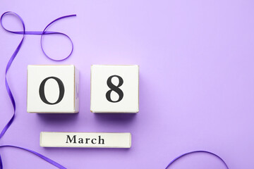 Calendar and violet ribbon on color background. International Women's Day celebration
