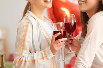 Happy transgender couple celebrating Valentine's Day at home