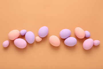 Beautiful Easter eggs on color background
